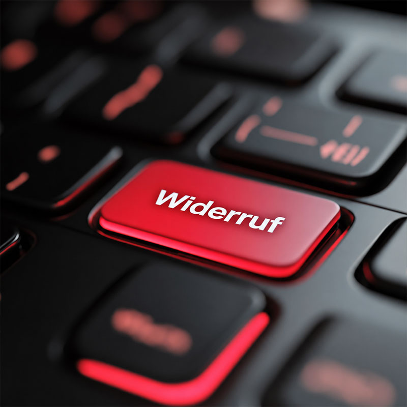 Eine Tastatur mit einer rot hervorgehobenen Taste mit der Aufschrift "Widerruf"